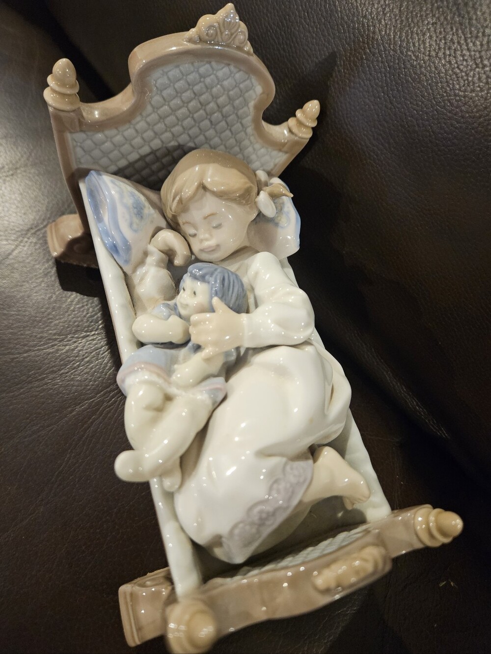 Lladro Porcelain Figurine of Girl Sleeping with Doll in Cradle